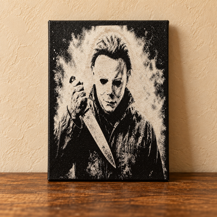 Michael Myers black and ivory canvas art on a rustic tabletop