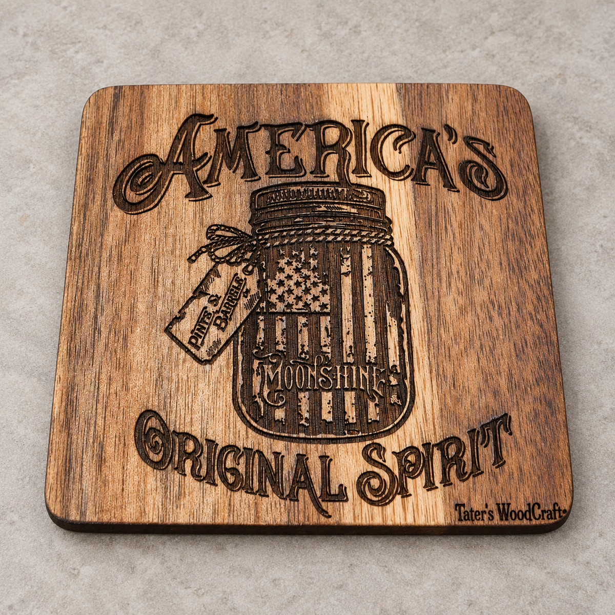 Individual square wooden coaster engraved with America's Original Spirit Moonshine design