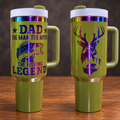 Two views of one olive green Dad Fishing Legend 40 oz tumbler with rainbow fish and woodland deer engraving