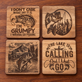 Four square wooden coasters with different fishing engravings