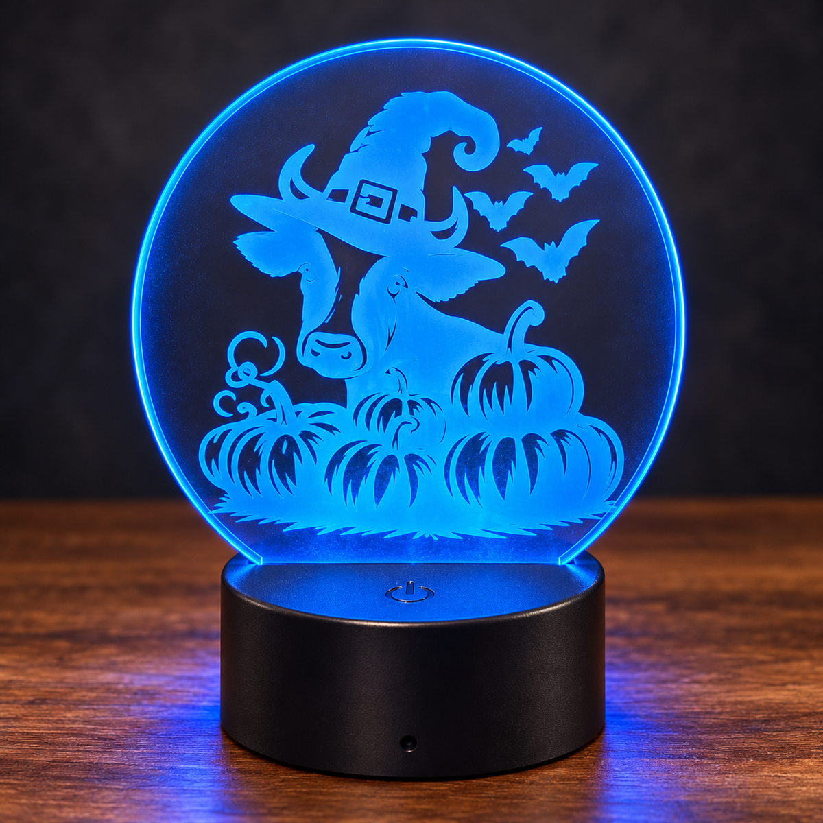 Halloween Highland cow acrylic LED light with pumpkins and bats, illuminated blue
