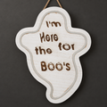 I'm Here for the Boo's Ghost engraved wooden sign with light border, photographed with lights off