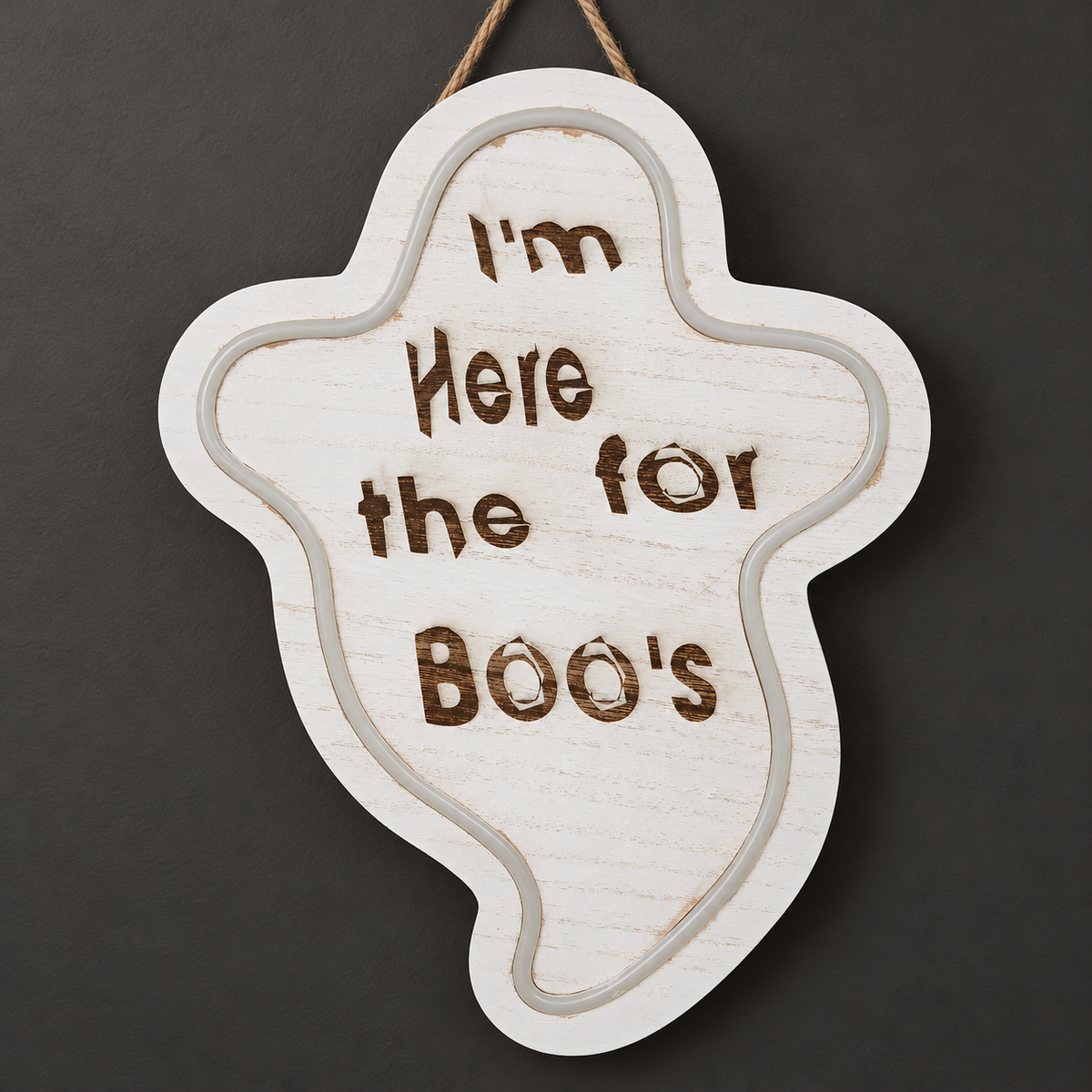 I'm Here for the Boo's Ghost engraved wooden sign with light border, photographed with lights off
