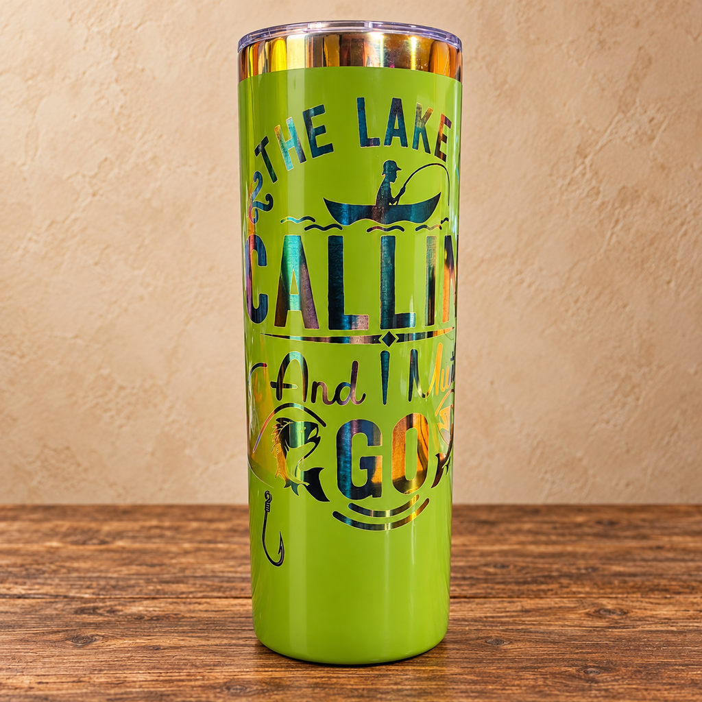 Green 20 oz skinny fishing tumbler with rainbow engraved lake quote