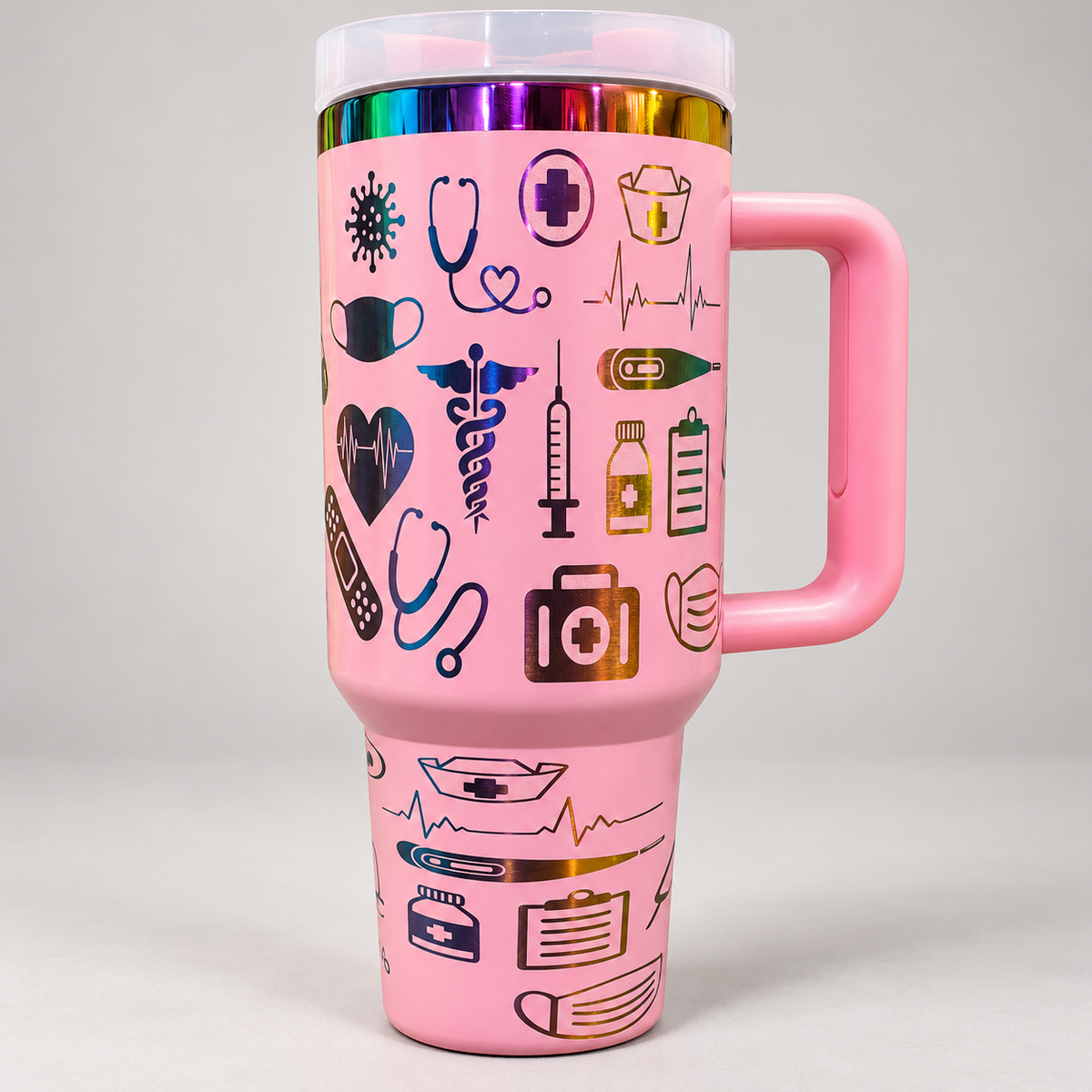 Pink 40 oz medical-themed handled tumbler with rainbow engraved icons